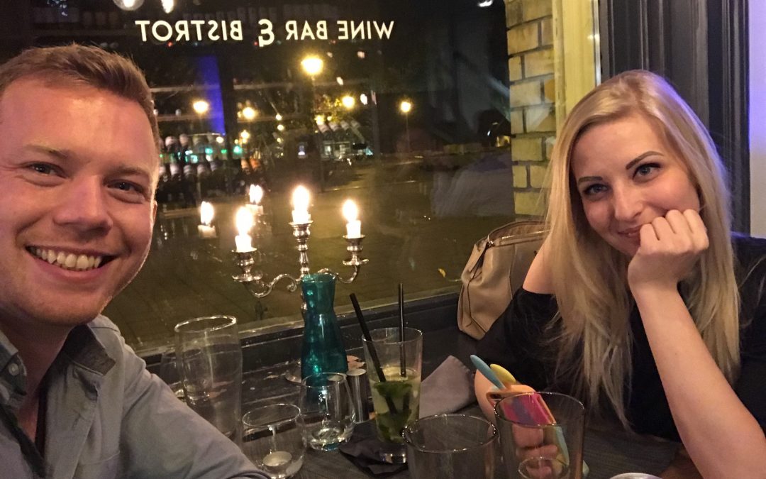 An image of Dan and Jennifer sitting in a bar in Budapest